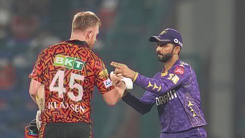 Kolkata Knight Riders' captain Ajinkya Rahane congratulates Sunrisers Hyderabad's Heinrich Klaasen on completing 100 runs during the Indian Premier League cricket match between Kolkata Knight Riders and Sunrisers Hyderabad at Arun Jaitley Stadium in New Delhi, India, Sunday, April 25, 2025.