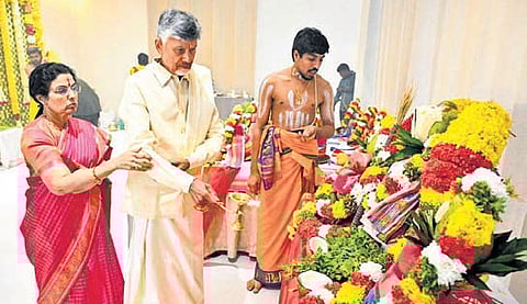 CM Naidu and his wife Bhuvaneswari perform rituals as part of the housewarming ceremony in Kuppam.