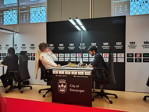 GM Magnus Carlsen in action against GM D Gukesh on Monday