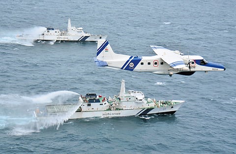 A Dornier aircraft and Indian Coast Guard vessels engaged in containing the oil spill and its spread in the Arabian Sea on Monday.