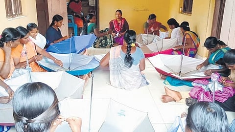 Women of Attappadi tribal hamlets in Palakkad manufacturing umbrellas