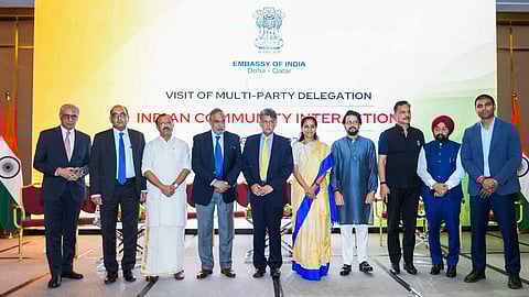 members of the multi-party parliamentary delegation during an interaction with the Indian community in Doha.
