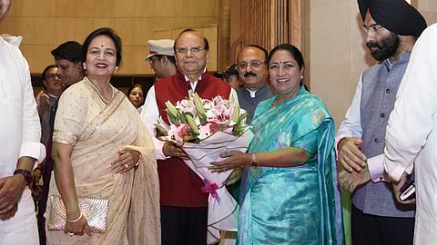 CM Rekha Gupta with L-G V K Saxena at a function on Monday.