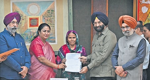 CM Gupta presenting offer letters at Delhi Secretariat on Tuesday