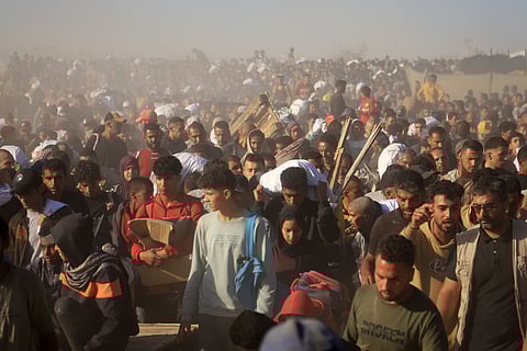 Palestinians at the aid distribution site of Gaza Humanitarian Foundation, a U.S.-backed organisation approved by Israel, in Rafah, southern Gaza Strip, Thursday, May 29, 2025.