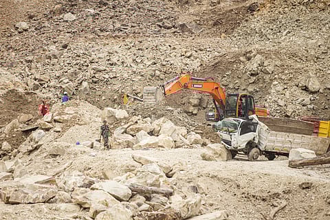 Rescuers use heavy equipment to search for landslide victims buried under rocks at the C excavation site in Cipanas, Dukupuntang, Cirebon Regency, West Java, on May 30, 2025.
