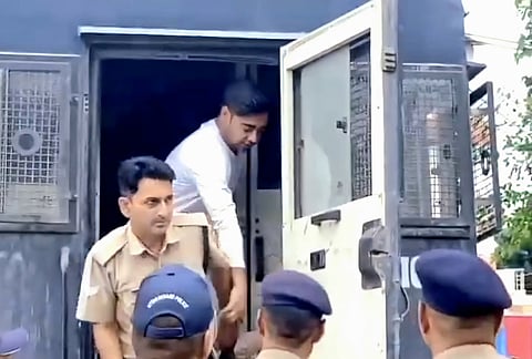 Pulkit Arya, main accused in the Ankita Bhandari murder case, being taken to court by police.