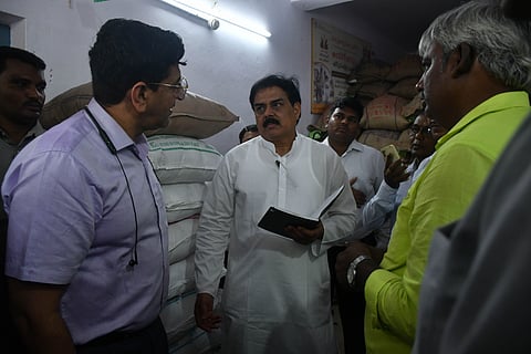 Civil Supplies Minister Nadendla Manohar inspects a ration shop at Madhuranagar in Vijayawada on Thursday