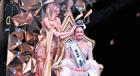 Outgoing Miss World Krystyna Pyszkova crowns Opal Suchata Chuangsri of Thailand the new Miss World at HITEX in Hyderabad on Saturday.