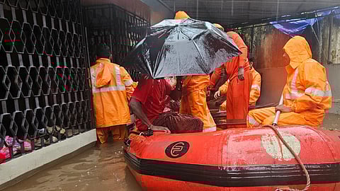 Residents being rescued from flooded houses in Thavakkara.
