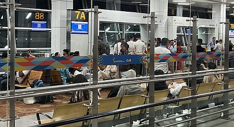 Passengers remain stranded at Terminal 3 of IGI Airport, New Delhi, after an Air India flight to Singapore was twice aborted due to a technical snag, Saturday, May 31, 2025.