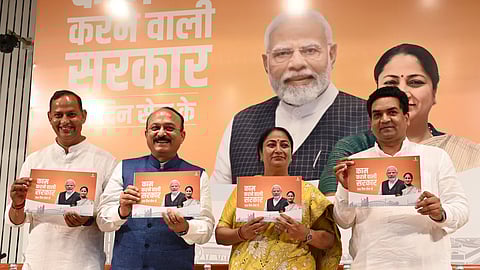 Delhi Chief Minister Rekha Gupta with cabinet ministers Ashish Sood and Kapil Mishra during a press conference regarding completion of 100 days of her government in the union territory, in New Delhi on Friday, May 30, 2025.