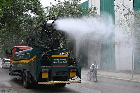 An anti-smog gun being used to spray water droplets to curb air pollution at Sarojini Nagar on May 30, 2025 in New Delhi.