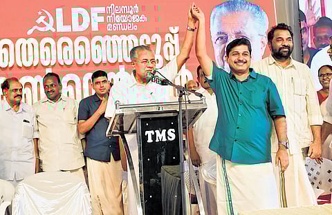 Chief Minister Pinarayi Vijayan endorses LDF candidate M Swaraj during the LDF election convention at Kodathipadi in Nilambur on Sunday.