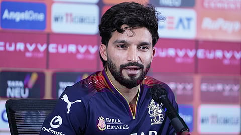 Captain of Royal Challengers Bengaluru Rajat Patidar addresses a press conference on the eve of the final match of Indian Premier League at Narendra Modi stadium in Ahmedabad, India, Monday, June 2, 2025.