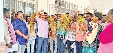 Farmers staging a protest at the Bargarh collector’s office on Monday.