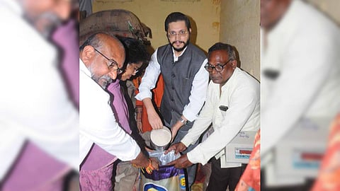 MD of AP Civil Supplies Corporation Dr Manazir Jilani Samun distributes ration goods to the card holders at Ongole -Santhapeta on Sunday.