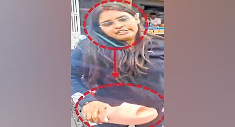 A video of the incident shows the woman assaulting the auto driver after a traffic dispute.