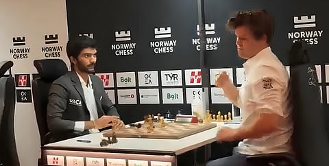 In the video, just after the win was sealed by Gukesh, Carlsen let out his emotions by banging the table, sending some pieces falling on the board and down on the floor too.