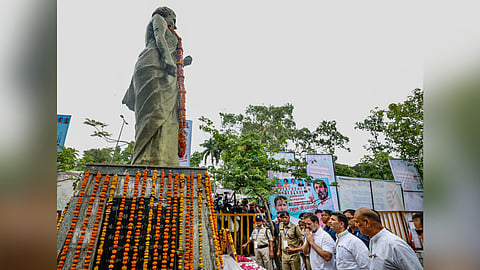 In this image posted by @INCIndia via X on Tuesday, June 3, 2025, Leader of the Opposition and Congress MP Rahul Gandhi pays tribute to the former Prime Minister Indira Gandhi, in Bhopal.
