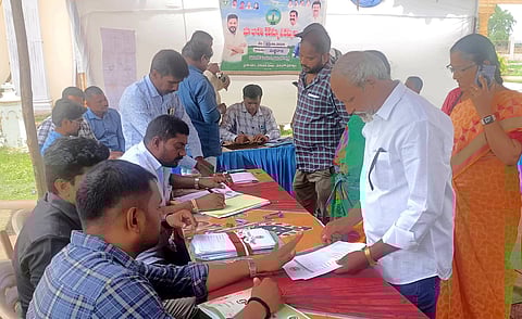 File Photo | On the first day of the Bhu Bharati Revenue Sadassulu, landowners gathered to seek resolution of longstanding land-related issues at Mulugu Road