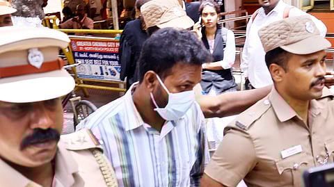 Gnanasekaran, who was sentenced to life without remission and a fine of rs 90,000, in Anna University sexual assault case, coming out of the court after the sentence was pronounced, on Monday in Chennai.