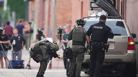 Law enforcement officials investigate after an attack on the Pearl Street Mall Sunday, June 1, 2025, in Boulder, Colorado.