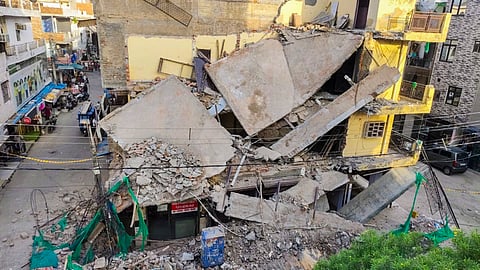 Remains of a two-storey commercial building that collapsed, at Rohini, in New Delhi, Wednesday, June 4, 2025.