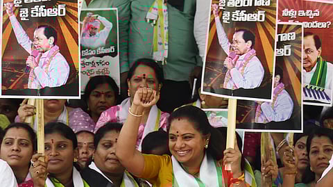 MLC Kalvakuntla Kavitha raises her fist in solidarity as Telangana Jagruti stages a Maha Dharna, protesting the Kaleshwaram Commissions notices to former Chief Minister K. Chandrasekhar Rao.