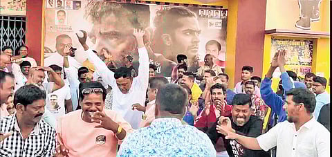 Fans celebrating the premiere of Haasan’s Thug Life at a Hosur theatre