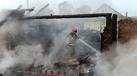 In this photo provided by the Ukrainian Emergency Service, firefighters put out the fire following Russia's drone attack in the Pryluky, Chernihiv region, Ukraine, Thursday, June 5, 2025.