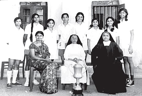 A former basketball team of St Teresa’s with principal Sr Digna