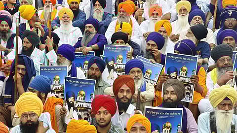 Activists from various Sikh organisations holding placards gather at the Golden Temple to offer prayers on the occasion of the 41st anniversary of Operation Blue Star, in Amritsar, Friday, June 6, 2025.