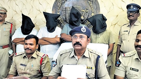Vizianagaram DSP M Srinivasarao revealing the modus operandi of the job racket to the media at the One-town police station on Saturday.
