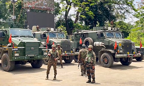 Security personnel keep vigil after the administration imposed prohibitory orders and suspending internet services in five Imphal valley districts following violent protests in Manipur over the arrest of a leader of Meitei outfit Arambai Tenggol, in Imphal, Sunday, June 8, 2025.