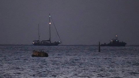 The Gaza-bound aid boat, Madleen, left, under escort of Israeli naval forces making its way toward Ashdod Port in southern Israel after being seized by Israeli forces, Monday, June 9, 2025.