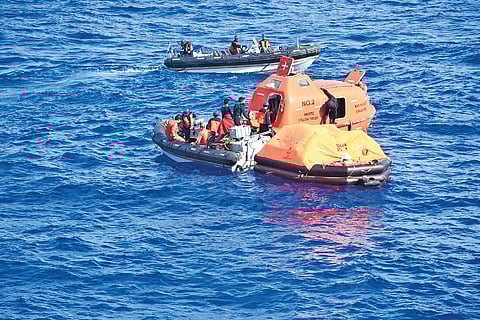 Rescue boats deployed to bring back stranded crew back to the shore.