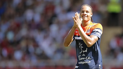 Montpellier’s Daniel Congre applauds during his French League One soccer match AS Monaco vs Montpellier, Sunday, Aug. 18, 2013, in Monaco stadium.