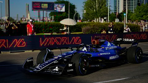 Williams driver Carlos Sainz of Spain steers his car during a demonstration on a section of the future Formula 1 street circuit in Madrid, Spain, Saturday, June 7, 2025.