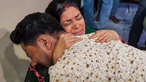 Govind Raghuvanshi, brother of Sonam Raghuvanshi who is among the five arrested for the murder of her husband Raja Raghuvanshi, consoles Raja's mother Uma Raghuvanshi during a visit at the latter's residence, in Indore, Wednesday, June 11, 2025.
