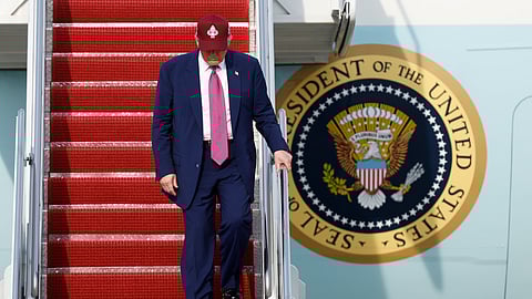 US President Donald Trump walks down the stairs of Air Force One upon his arrival at Joint Base Andrews, Md., Tuesday, June 10, 2025.