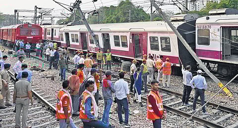 A coach of train derailed near Shivaji Bridge in New Delhi on Thursday.