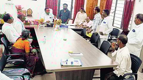 The RDO interacts with some of the elderly parents abandoned by their children at his office, in Nalgonda in this file photograph