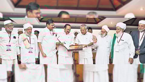 Chief Minister Pinarayi Vijayan releasing ‘Confluence’, the coffee table book on Samastha Kerala Jem-iyyathul Ulama brought out by TNIE, by handing over a copy to Leader of Opposition V D Satheesan. (From left) Also seen are K Moyin Kutty, Vakkode Moideenkutty Faizi, Sports Minister V Abdurahiman, Sayyid Muhammed Jifri Muthu Koya Thangal, P P Umer Musliyar Koyyod and Syed Mohammed Koya Thangal Jamalullaili.