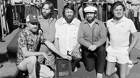 Members of The Beach Boys, from left, Mike Love, Carl Wilson, Brian Wilson, Al Jardine and Bruce Johnston, pose with their star on the Hollywood Walk of Fame, during a ceremony in Los Angeles on Dec 30, 1980.