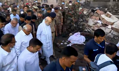 Union Home Minister Amit Shah with Gujarat CM Bhupendra Patel takes stock of the situation following the Air India plane crash, in Ahmedabad, Thursday, June 12, 2025