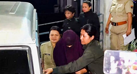 Police escort Sonam Raghuvanshi, accused in the alleged murder of her husband Raja Raghuvanshi during their honeymoon in Meghalaya, after her medical check-up at Ganesh Das Hospital, in Shillong, Wednesday, June 11, 2025.