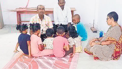 Teachers and students of a local school in Gowndlapalem village in Wyra mandal