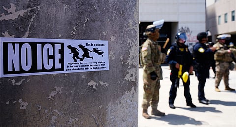 DHS police and National Guard protect the outside the Metropolitan Detention Center, Wednesday, June 11, 2025, in Los Angeles.