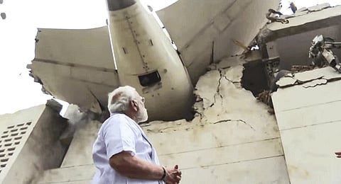 Prime Minister Narendra Modi visits the site of yesterday's Air India plane crash as well as the lone survivor at a hospital in Ahmedabad, Friday, June 13, 2025.